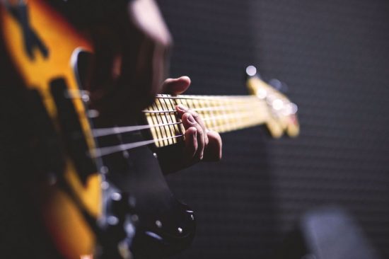 bass guitar being played